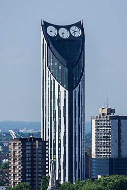 Skyscraper with three integrated wind turbines