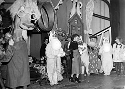 The Moomins and Tove Jansson perform on stage in 1949