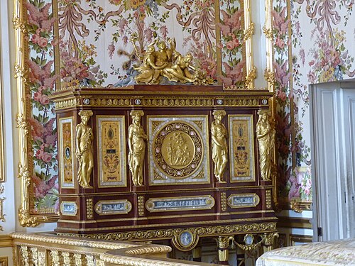Louis XVI style jewelry locket of Marie-Antoinette, by Ferdinand Schwerdfeger, 1787, mahogany, mother-of-pearl inlays, paintings under glass, porcelain plate, and gilded bronzes, Chambre de la Reine, Palace of Versailles, Versailles, France[26]