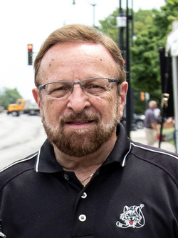 Wayne Messmer, the celebrated National Anthem soloist for the National Hockey League's Chicago Blackhawks stands at the Skokie Independence Day Parade before its cancellation due to safety concerns after an active shooter incident in Highland Park, Illinois.