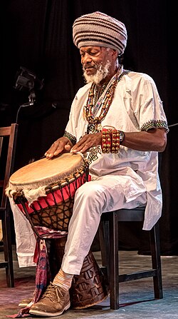 Achee performing in 2016