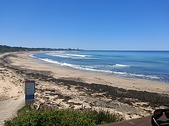 Wallabi Beach at Wallabi Point on a cloud-free, bright Spring day.