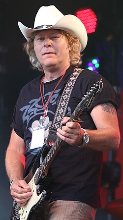 Moses performing with Los Pacaminos in 2014