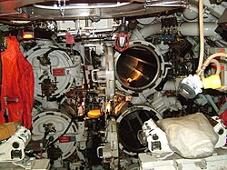 Torpedo tubes and escape hatch.