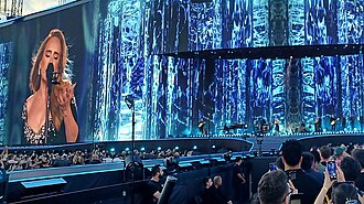 Adele and her backing band performing on the main stage