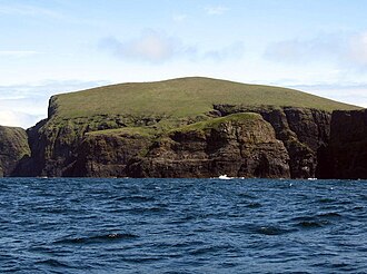 The western cliffs of Mingulay with Arnamuil in the centre