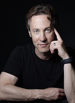 David Eagleman wearing a dark shirt