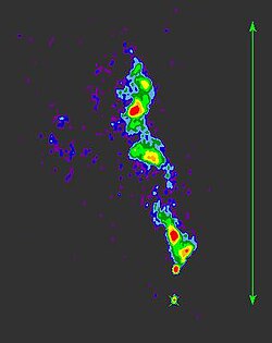 Radio map of the quasar 3C48 made from VLBA 1.4-GHz observations, made by uploader. Cross indicates core, arrow shows 0.5 arcsec.