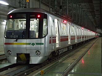 A Toei 12-000 series train at Kiba Depot