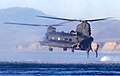 A 160th SOAR(A) MH-47 conducts water insertion of Marine Raiders