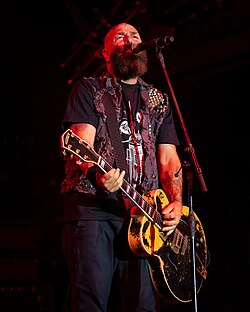 Armstrong performing in 2023
