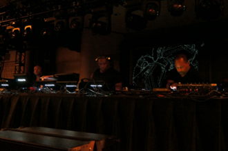 The Belleville Three performing at the Detroit Masonic Temple in 2017. From left to right: Juan Atkins, Kevin Saunderson, and Derrick May