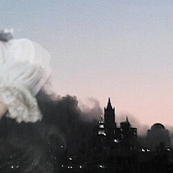 A view of New York City's buildings with dense fog on the left