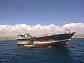 Exporting charcoal by Indian boat