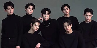 Trainee A in 2022 Left to right, standing: Jihoon, Yorch, Woochan, Sangwon, and James Sitting: JJ and Leo