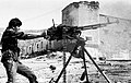 A Kurdish fighter firing the DShK during the 1991 Iraqi uprising
