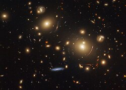 Gravitational lensing system SDSS J0928+2031.[11]