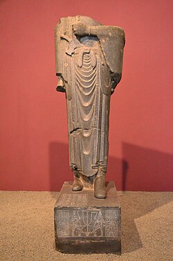 An Egyptian statue of Darius I, as Pharaoh of the Twenty-seventh Dynasty of Egypt;[94] 522–486 BCE; greywacke; height: 2.46 m;[67] National Museum of Iran (Teheran)