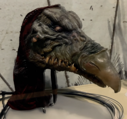 The head of the skekShod puppet used in The Dark Crystal on display at the Center for Puppetry Arts, Atlanta