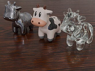 3D rendered image showing three copies of a cartoon cow. The one on the left has a metallic surface, and the one on the right uses a transparent glass material. The cow in the center appears made of glazed porcelain. The cows are standing on a wooden table. Lights and other background details from a cafe environment are reflected in the slightly glossy table and the cows.