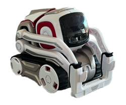 A small, white and gray robot with red highlights and a square black face