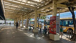 Ayala bus stop, beside McKinley Exchange Corporate Center
