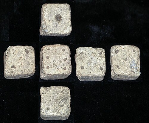 Composite image of all sides of a 12 mm (1⁄2 in) Roman die, found in Leicestershire, England