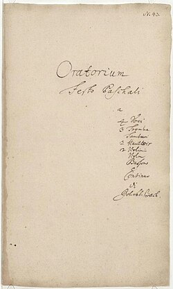 Title page of the 1738 autograph, the title and occasion in Latin centered, the performing instruments in a column in the right half