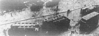 Derailed railcars on their sides