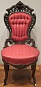 Rococo Revival chair (c. 1850–1855), by Joseph Meeks & Sons.