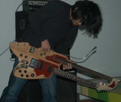 Katsumi Sugahara performing live with an early/unfinished version of his personal home made guitar built by Masahiko Ohno around 2006