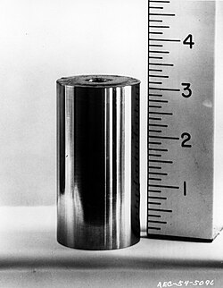 A metal cylinder with a ruler next to it, 3.1 cm high