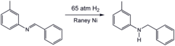 Hydrogenation of an imine using a Raney nickel catalyst, a popular heterogeneous catalyst.