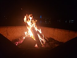 Fire within a fire ring on Vacation Isle, Mission Bay.