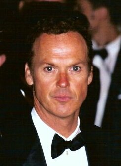 A formally-dressed Michael Keaton