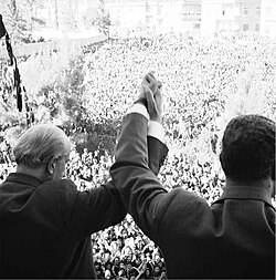 Nasser and Quwatli clasp hands