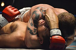 Arm triangle choke from the mount position