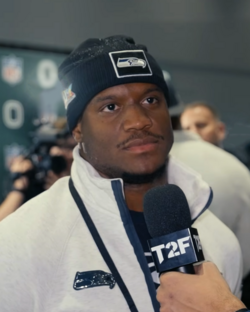 Headshot of Walker with a Seahawks beanie