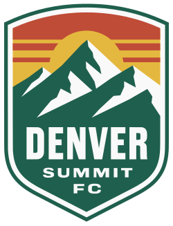 A shield depicting a green and white mountain range against a yellow sun and dark orange sky.