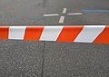 Red and white barricade tape
