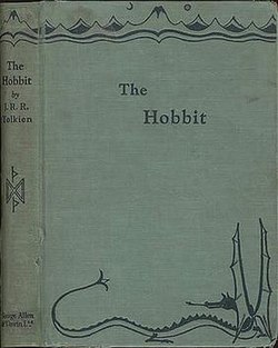 A light green cloth book cover featuring the book title in plain letters. At the top is a line drawing of a mountain range under the sun and moon; at the bottom is a line drawing of a dragon with its tongue out and wings erect.
