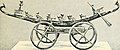 Gold boat model mounted on chariot wheels, from the tomb of Queen Ahhotep, c. 1550 BC.[25]