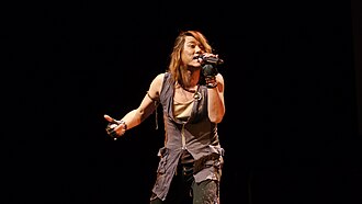 Yamada performing in 2013