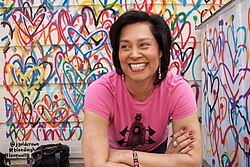 Headshot of Zain Verjee, Kenyan-born journalist and AI communications strategist