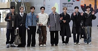 Alpha Drive One in 2026 L–R: Junseo, Arno, Leo, Anxin, Sangwon, Xinlong, Sanghyeon, and Geonwoo