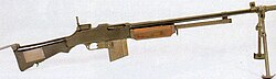 Browning Automatic Rifle M1918A2 shown in profile, with bipod mounted near the muzzle and a carrying handle on the barrel.