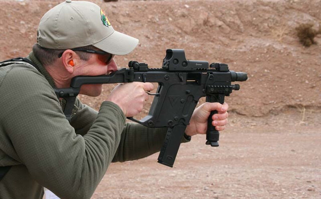 2010 SHOT Show - Shooting the Kriss SMG (27547415085).jpg