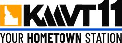 On the top row, the outline of the state of Idaho in white on an orange box next to the letters KMVT, with the M stylized as three stripes, and a taller numeral 11 in a sans serif. Beneath, a blue bar and the slogan "Your Hometown Station" in a compressed sans serif, with "Hometown" bolded.