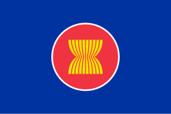 Ten yellow rice stalks on a red circle with a blue background