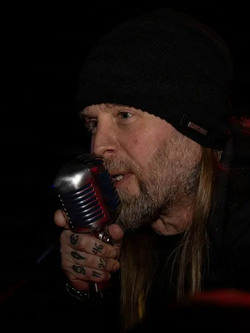 McCombs performing with Drowning Pool in 2026
